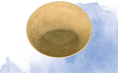 　南宋青釉刻花“吉”字碗。  　　中國國家版本館中央總館供圖